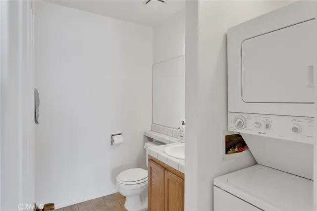 a view of bathroom with a toilet sink and tub