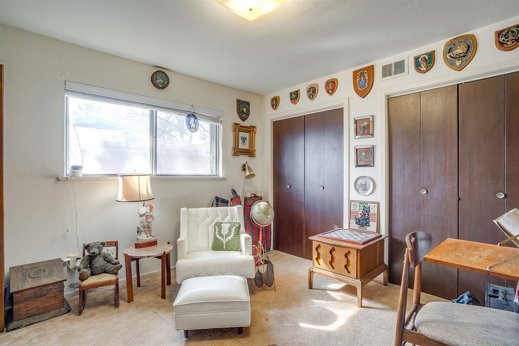 1525 Jenson Road Fort Worth, TX 76112 - Photo 27 of 40 This is the middle bedroom in the hallway that is currently used as a sitting room.