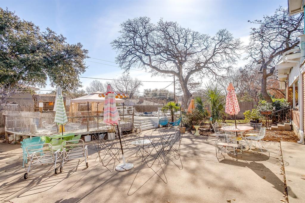 1525 Jenson Road Fort Worth, TX 76112 - Photo 38 of 40 Currently the backyard is hibernating but in the Summer, it's magical!