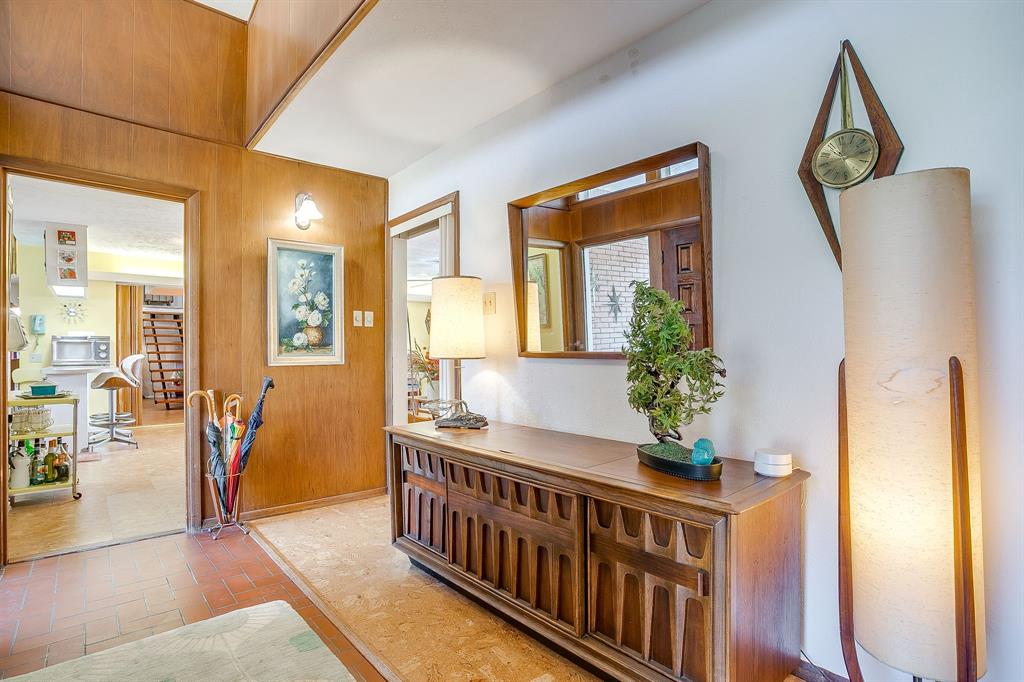 1525 Jenson Road Fort Worth, TX 76112 - Photo 9 of 40 Gorgeous foyer with the kitchen to the left and the hallway to the bedrooms to the right.