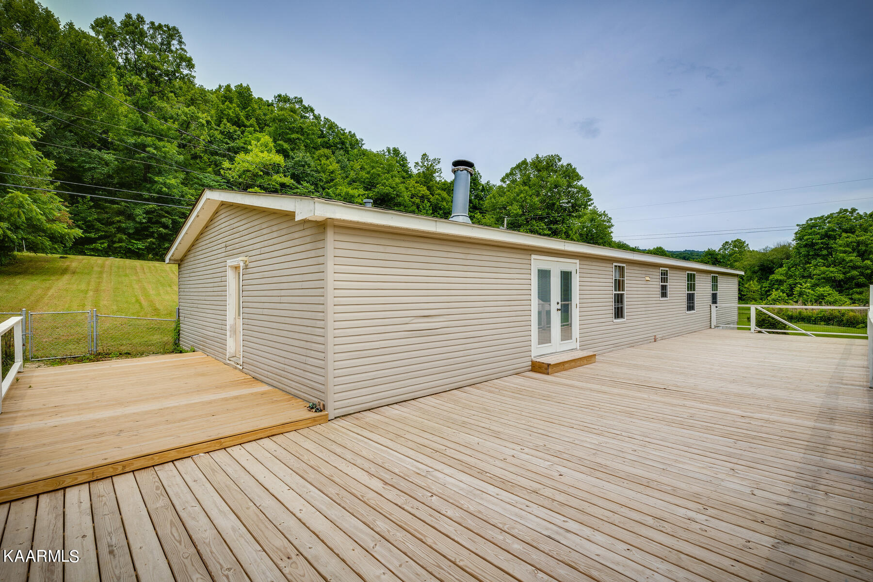 4500 Buffalo Road Oneida, TN 37841 - Photo 33 of 53 Wrap Around Deck to Laundry/Mudroom