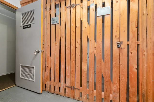 a view of wooden floor with entryway