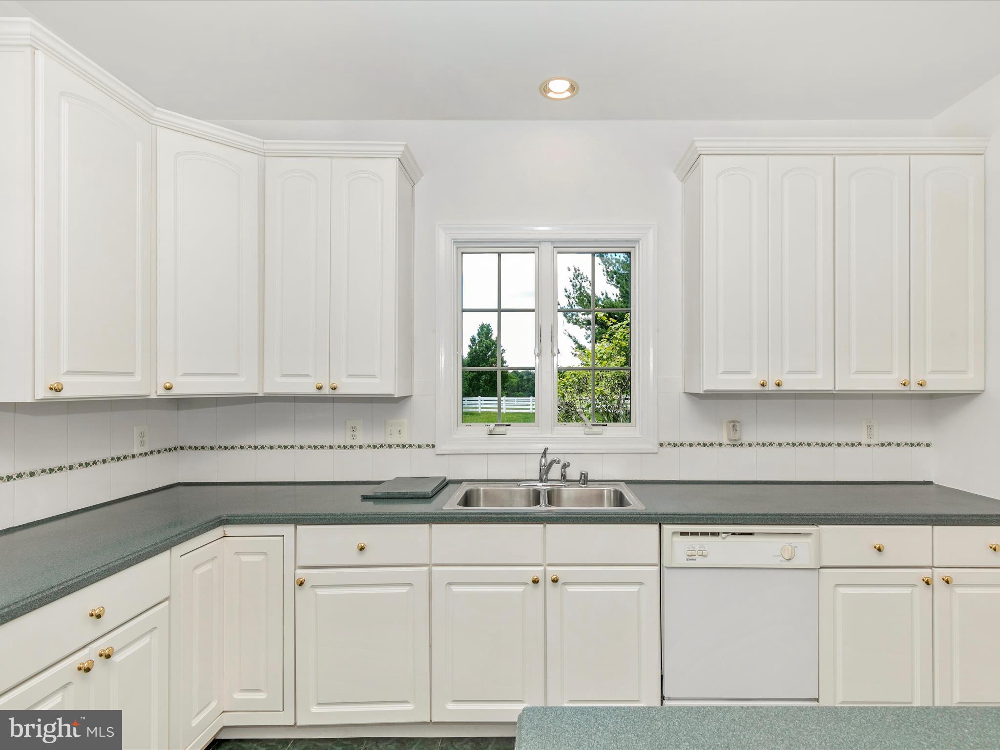 3304 Grayling Drive Mount Airy, MD 21771 - Photo 24 of 80 White Kitchen features an abundance of cabinetry