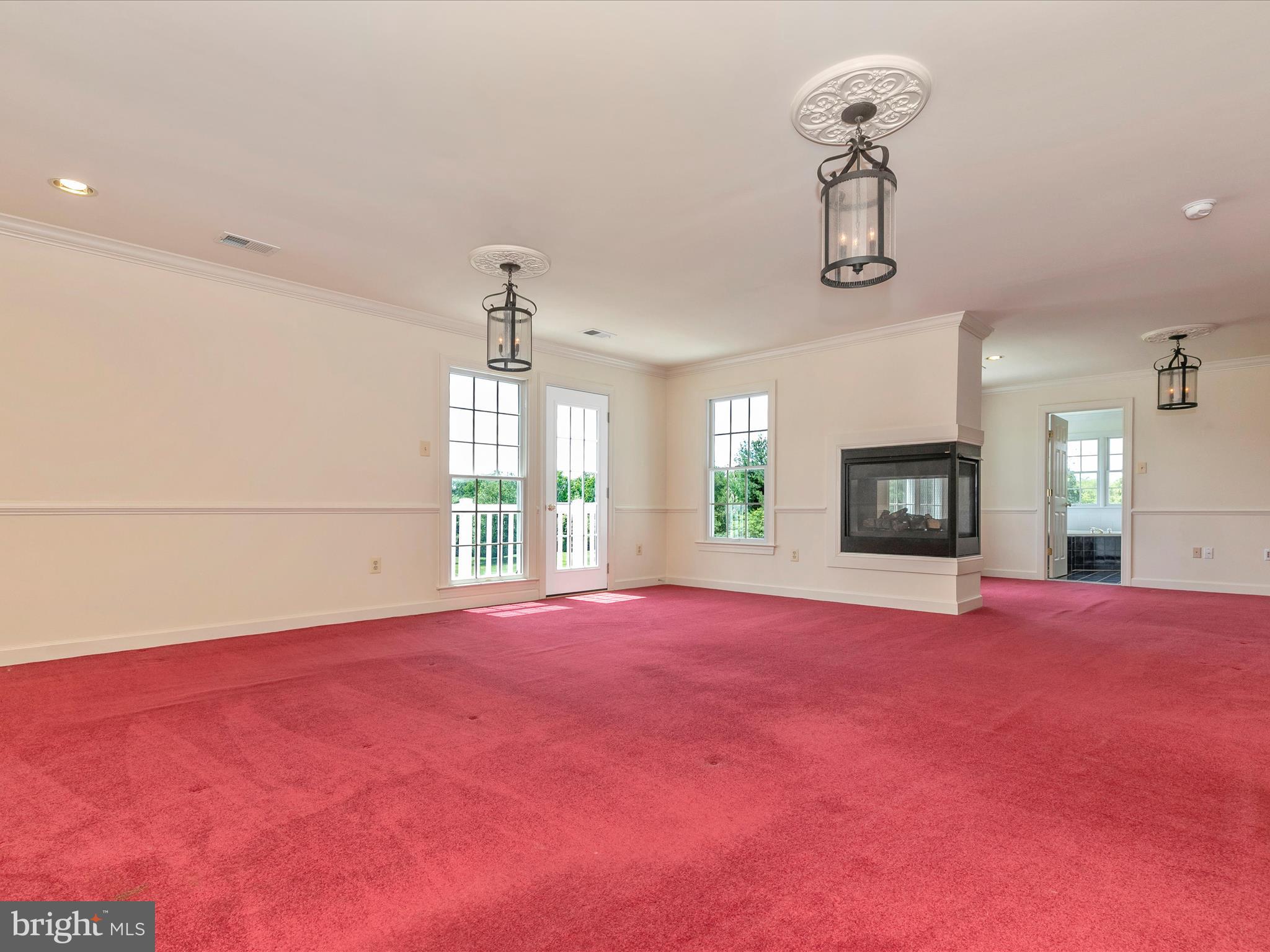 3304 Grayling Drive Mount Airy, MD 21771 - Photo 35 of 80 Primary Bedroom with double-sided gas fireplace