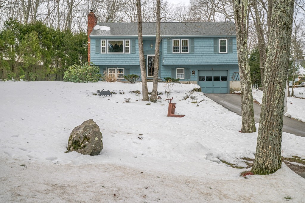 153 Leslie Road Rowley, MA 01969 - Photo 1 of 21 a view of roof with a tree