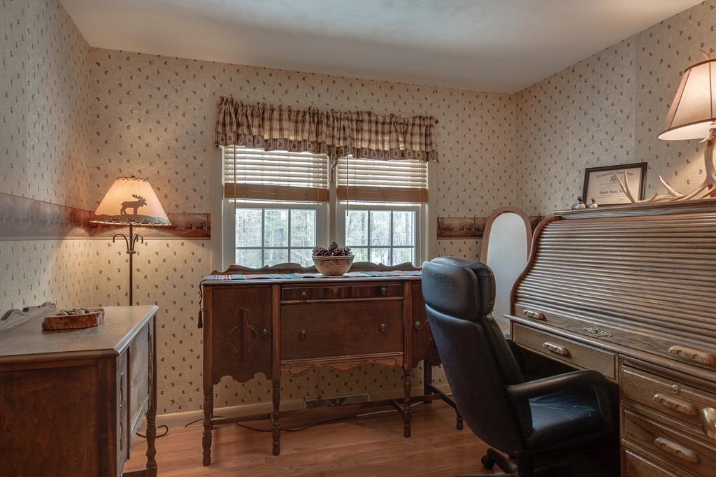153 Leslie Road Rowley, MA 01969 - Photo 13 of 21 a view of a workspace with furniture and a window