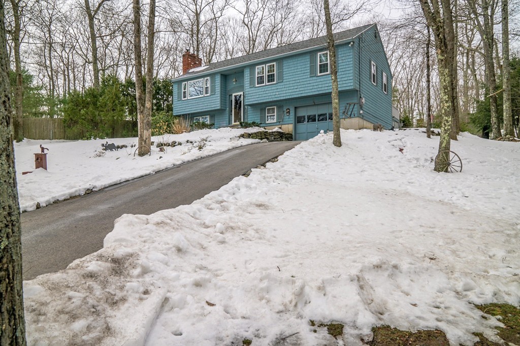 153 Leslie Road Rowley, MA 01969 - Photo 21 of 21 a street view with a building