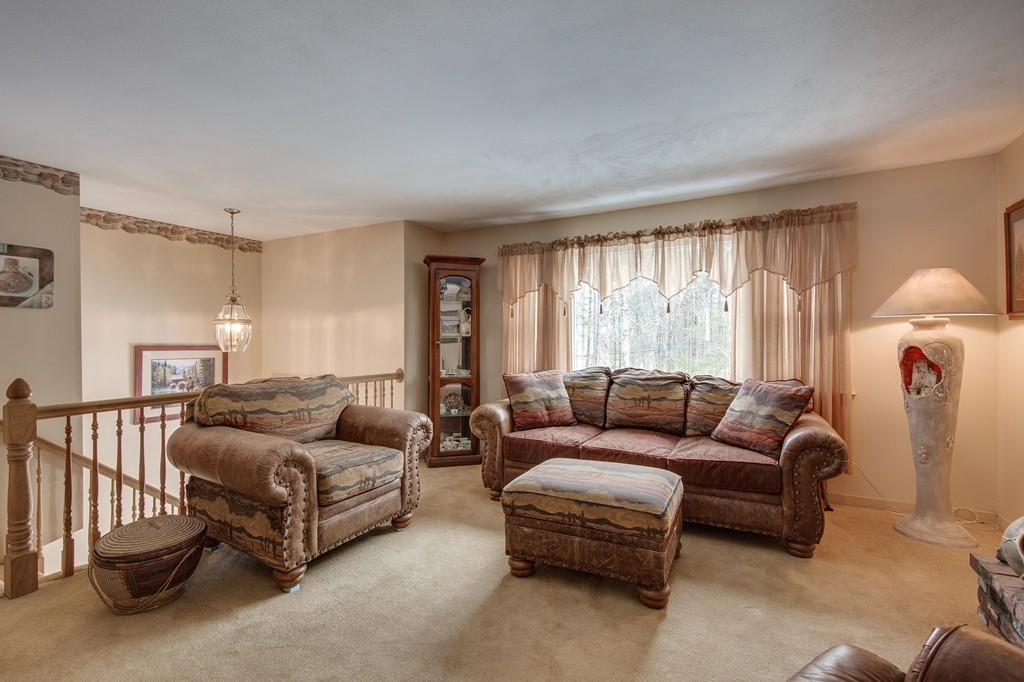 153 Leslie Road Rowley, MA 01969 - Photo 5 of 21 a living room with furniture and a window