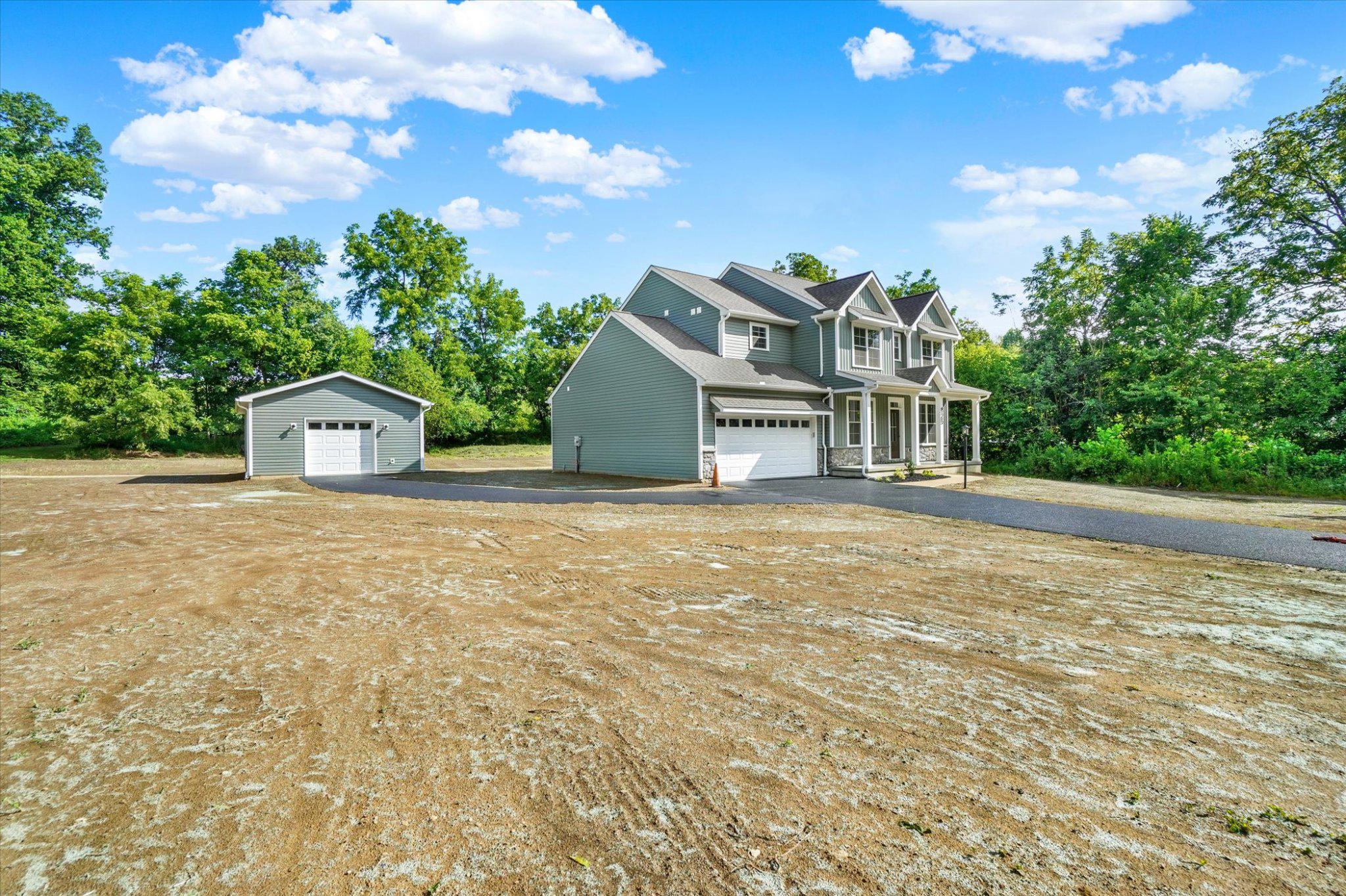 825 Furnace Road York, PA 17406 - Photo 30 of 37 View of flat wooded lot w/ detached garage.