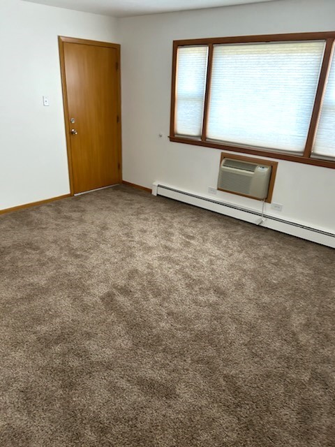 21-w139 Tee Lane Lane, Unit 2 Itasca, IL 60143 - Photo 2 of 9 an empty room with windows