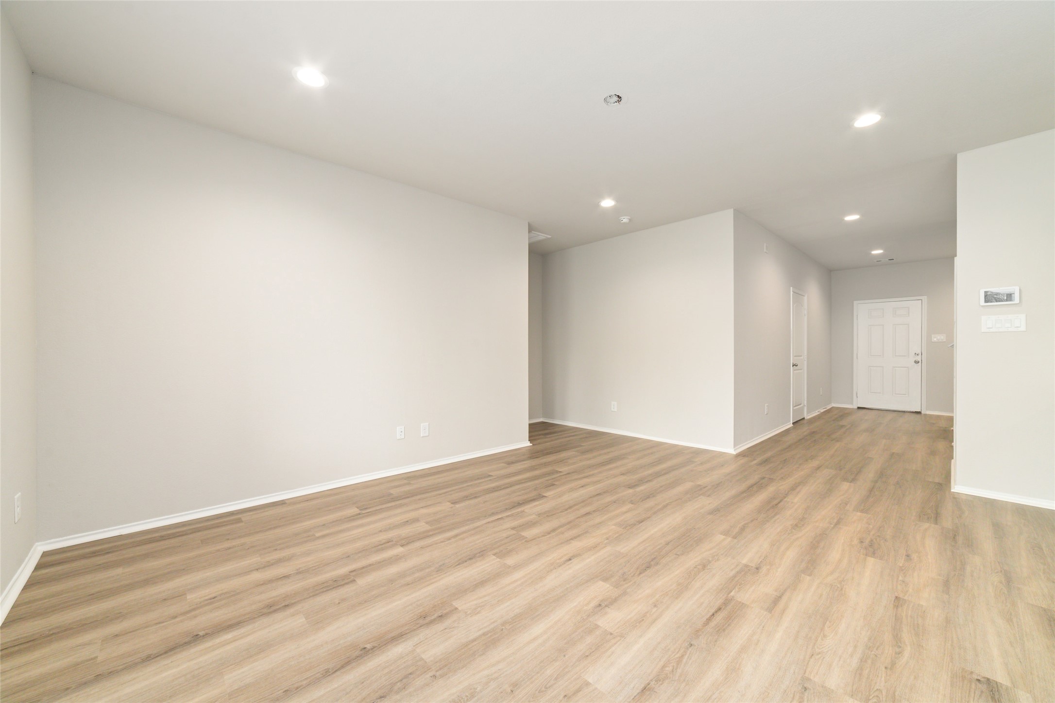 23702 Harrow Field Ln Spring Spring, TX 77373 - Photo 8 of 32 a view of empty room with wooden floor