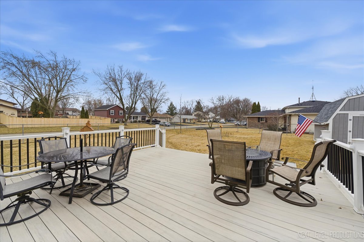 104 Augusta Road Oswego, IL 60543 - Photo 22 of 24 a view of a chairs and table on the terrace