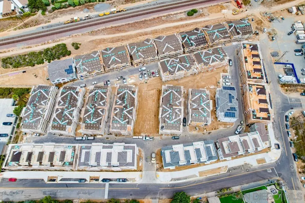 7479 Ponto Road Carlsbad, CA 92011 - Photo 14 of 26 a building with an outdoor space