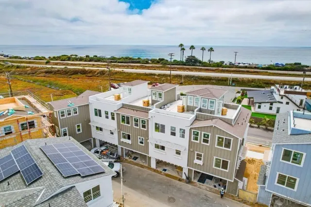 a view of city with ocean