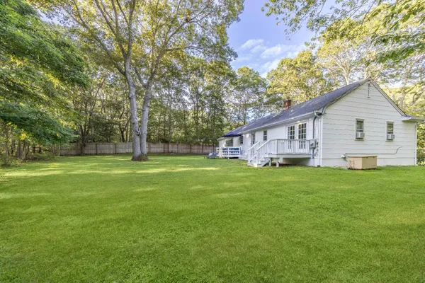a view of a house with a big yard