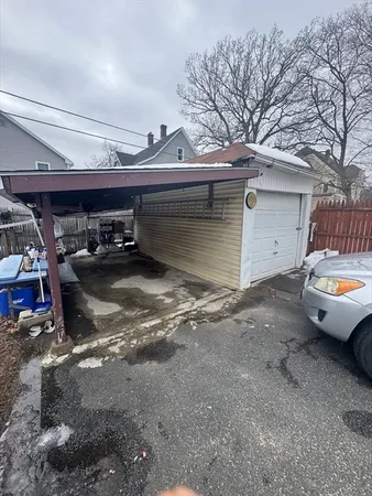 a view of parking garage with cars