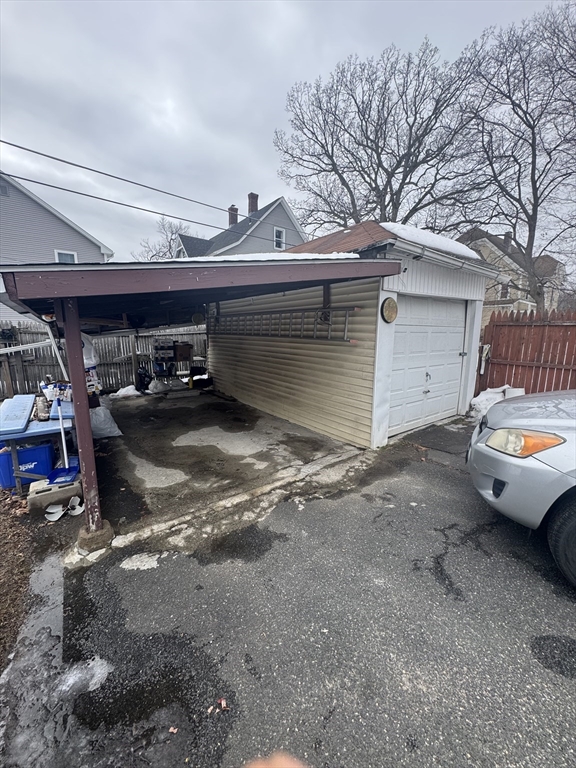158 Bowles Street Springfield, MA 01109 - Photo 3 of 17 a view of parking garage with cars