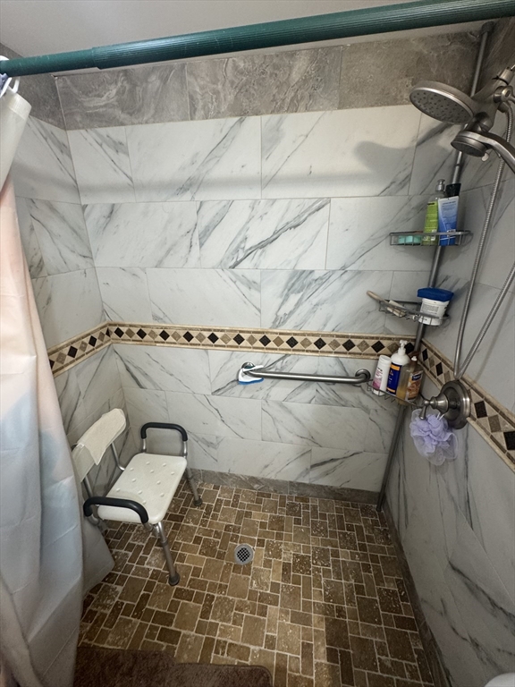 158 Bowles Street Springfield, MA 01109 - Photo 8 of 17 a utility room with a couch