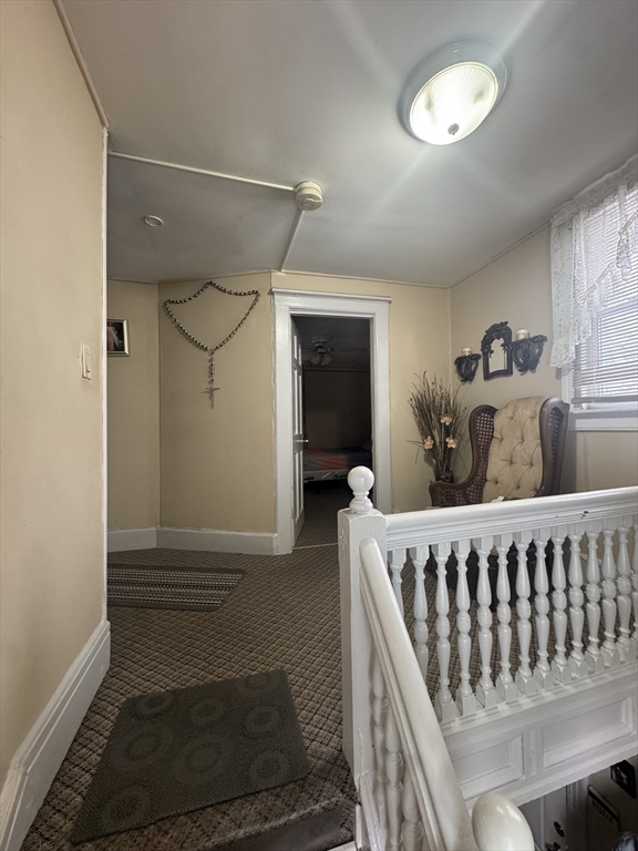 158 Bowles Street Springfield, MA 01109 - Photo 10 of 17 a bedroom with furniture and a window