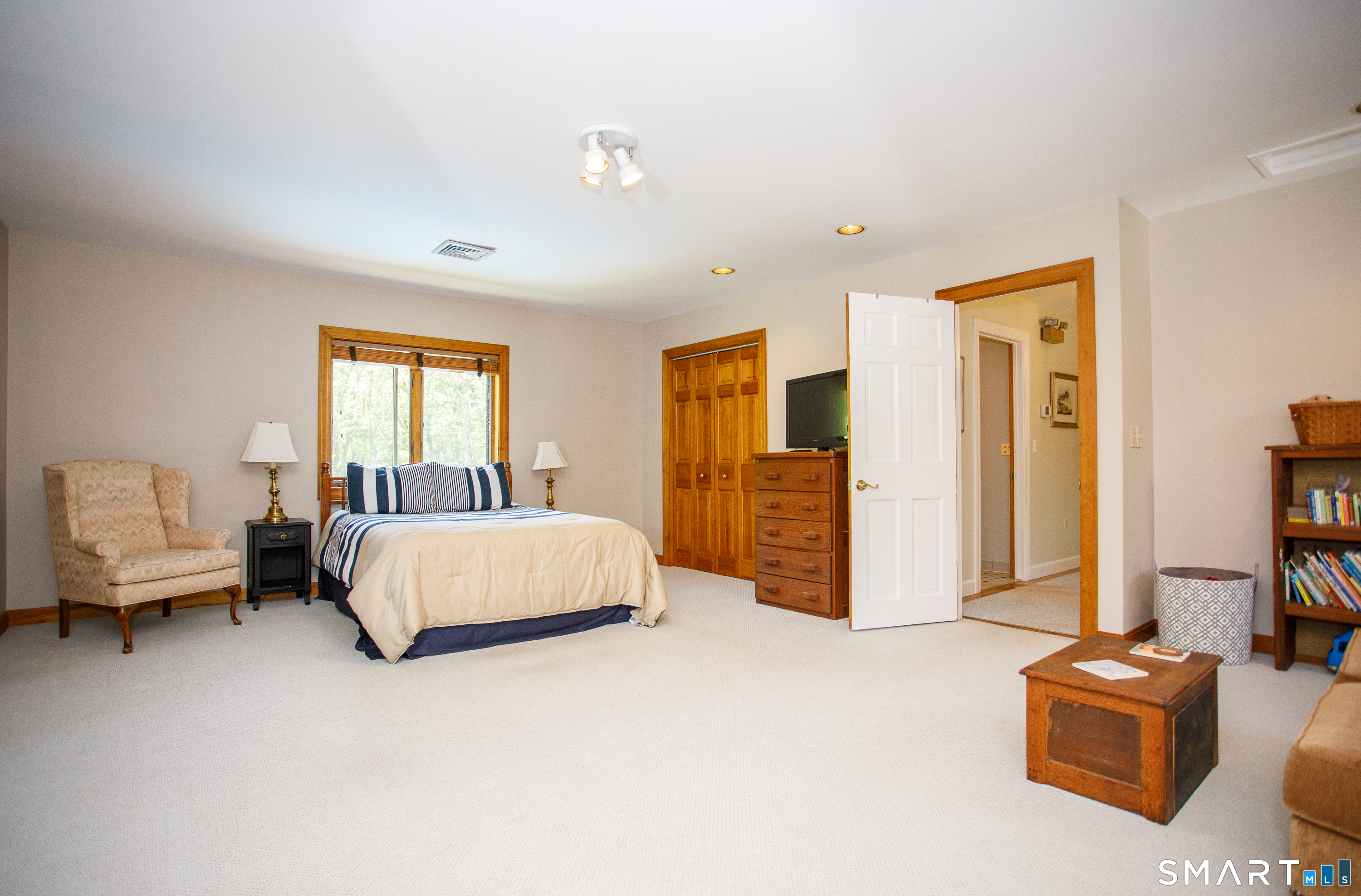 25 Stony Ridge Road Norwich, CT 06360 - Photo 26 of 40 a spacious bedroom with a bed and couch
