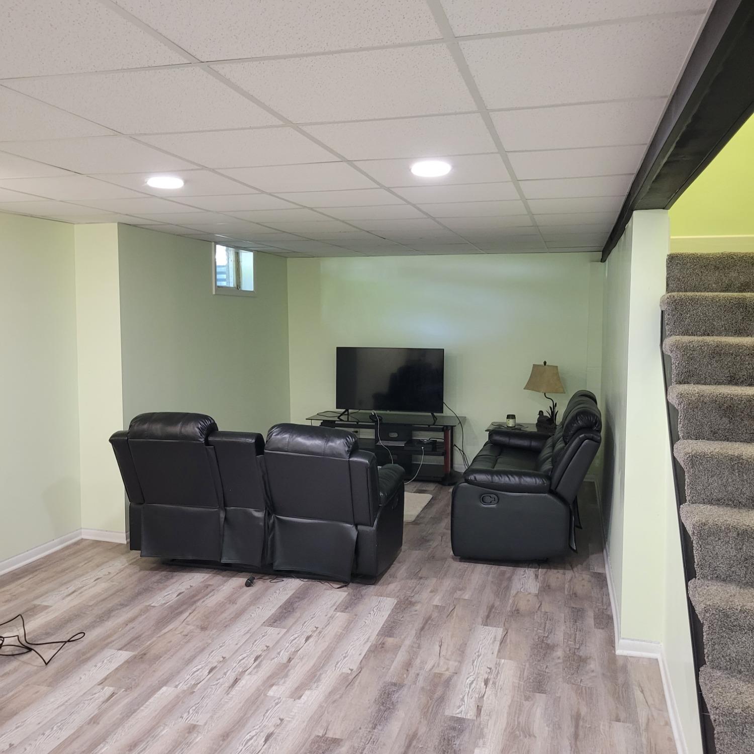 716 South Sherman Street Crown Point, IN 46307 - Photo 14 of 25 a living room with furniture and a flat screen tv