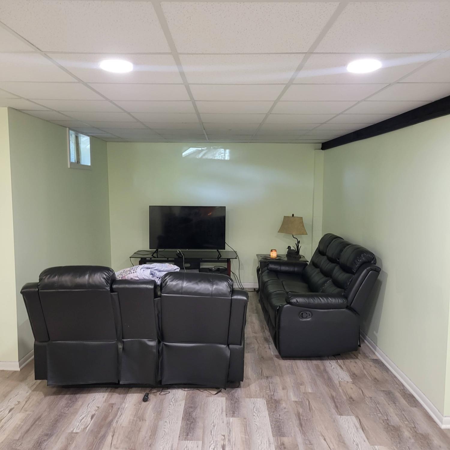 716 South Sherman Street Crown Point, IN 46307 - Photo 15 of 25 a living room with furniture and a flat screen tv