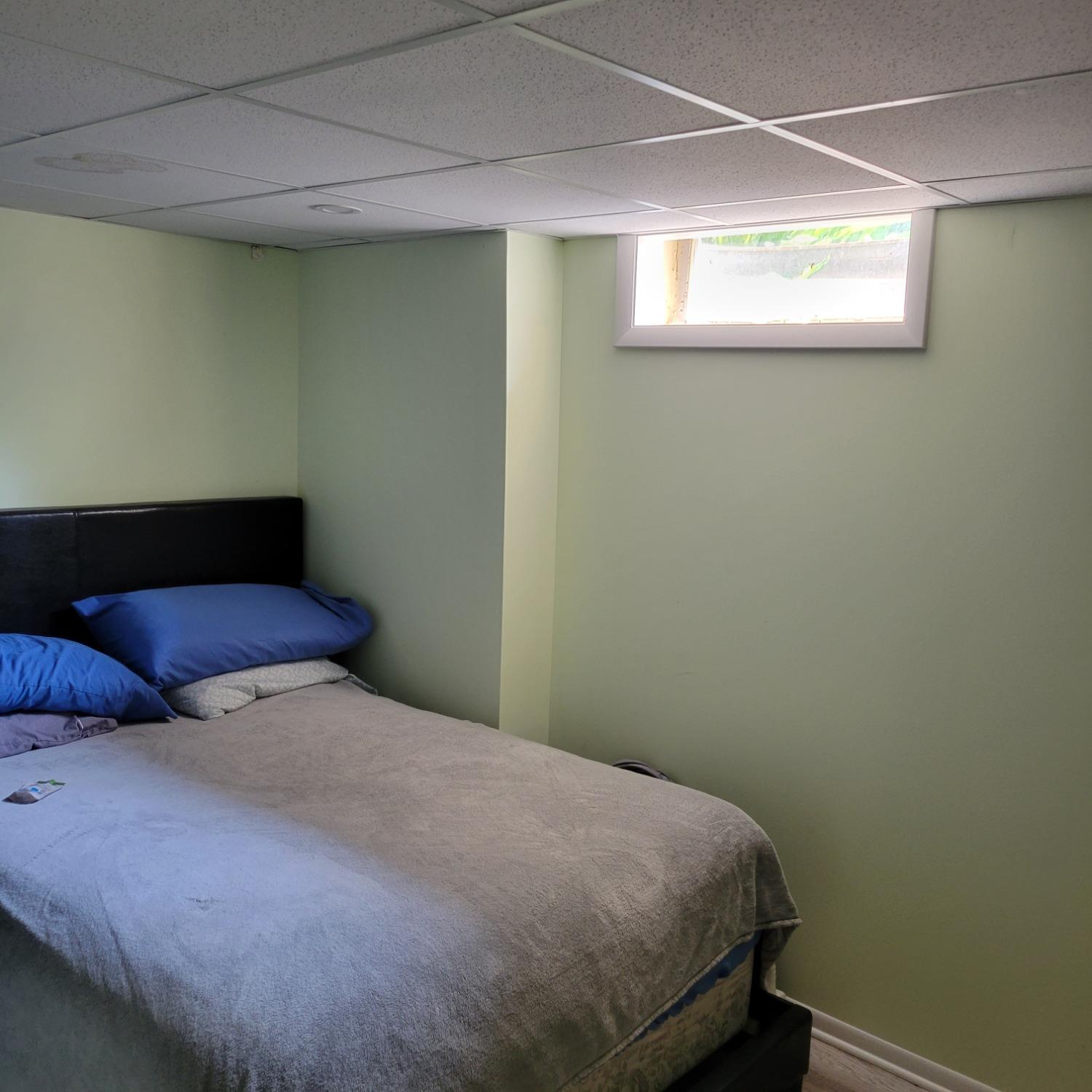 716 South Sherman Street Crown Point, IN 46307 - Photo 16 of 25 a bedroom with a bed and a window