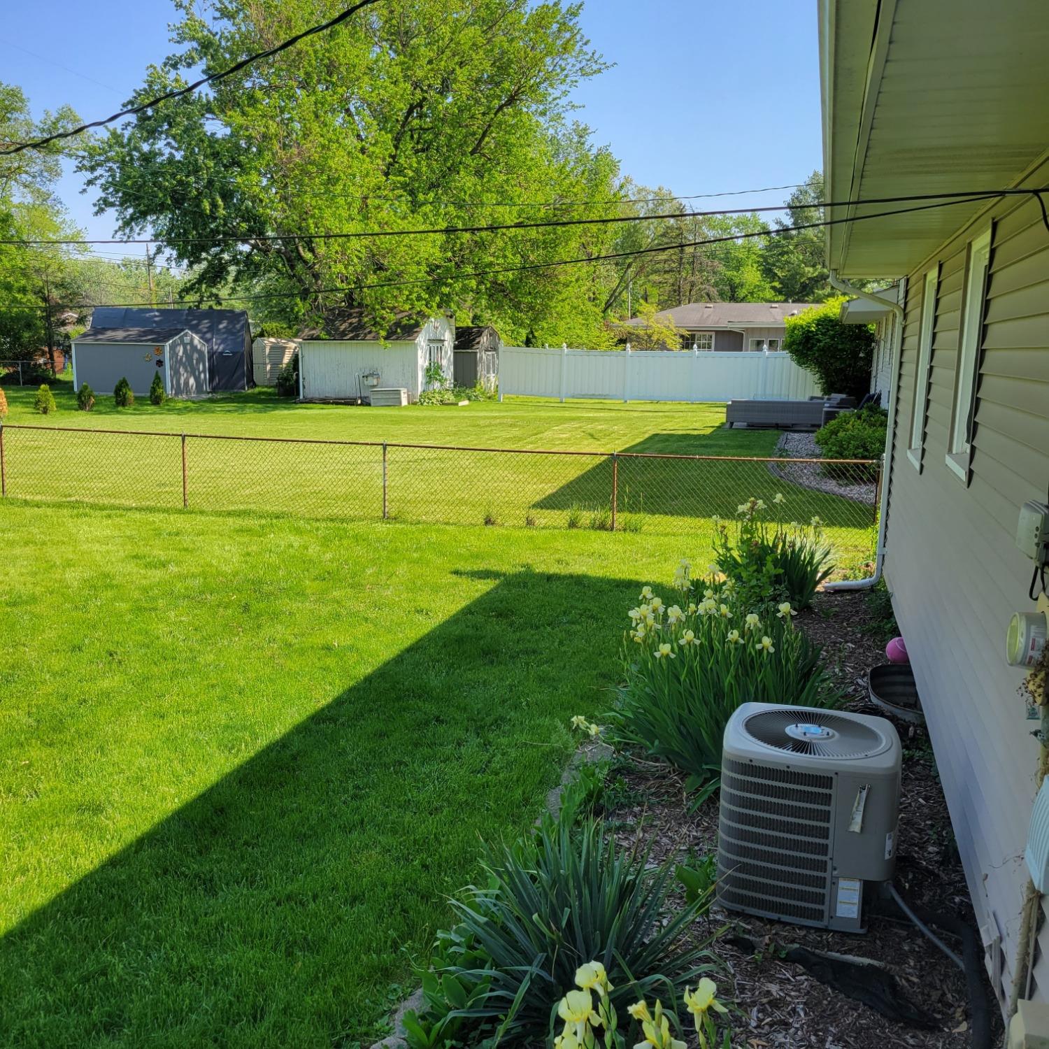 716 South Sherman Street Crown Point, IN 46307 - Photo 22 of 25 a view of a golf course with a garden