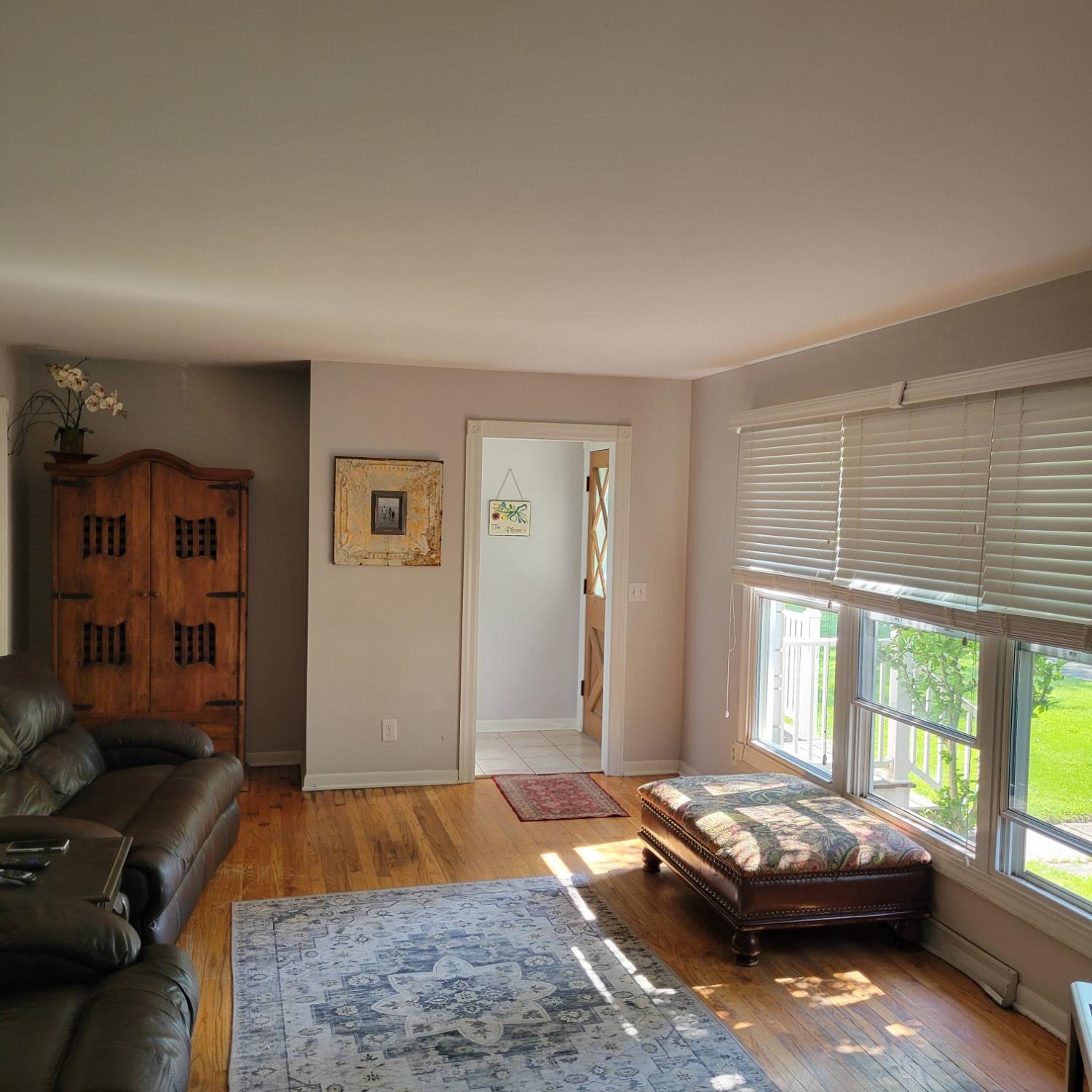 716 South Sherman Street Crown Point, IN 46307 - Photo 4 of 25 a living room with a bed furniture and a window