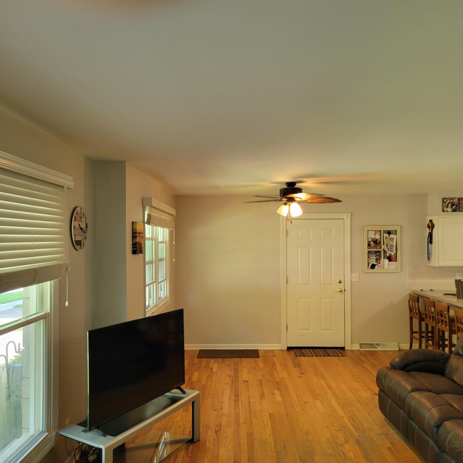 716 South Sherman Street Crown Point, IN 46307 - Photo 5 of 25 a view of a livingroom with furniture and a flat screen tv