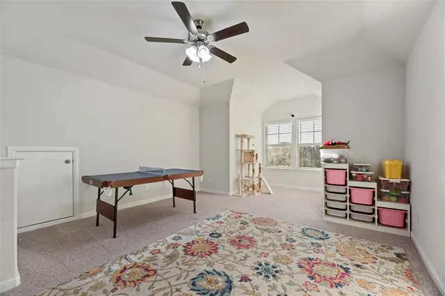 a bedroom with furniture and a chandelier