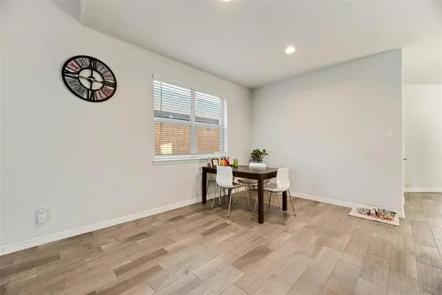 a view of a work space with furniture and window