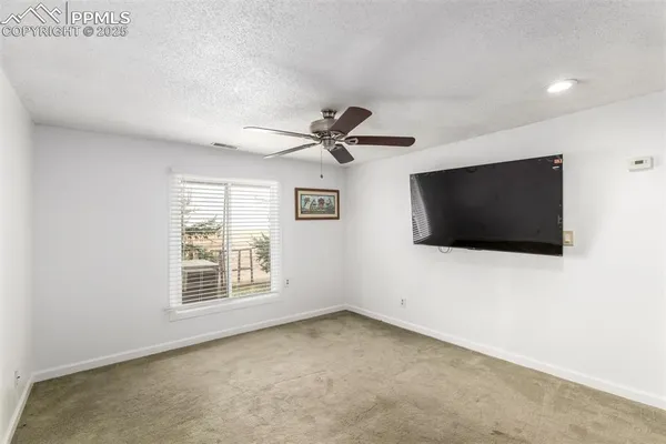 a view of a livingroom with a flat screen tv