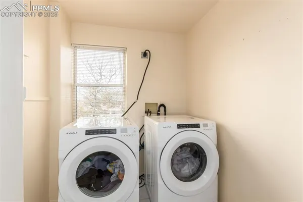 a utility room with dryer and washer