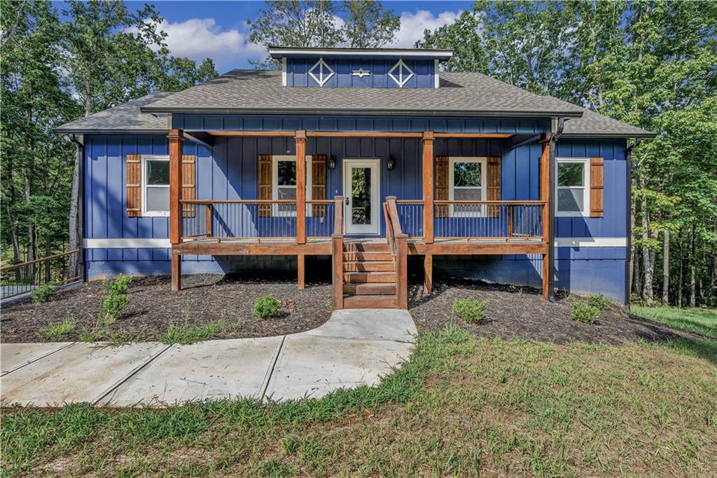 70 Country Hills Road Ellijay, GA 30540 - Photo 1 of 1 a view of house with outdoor space