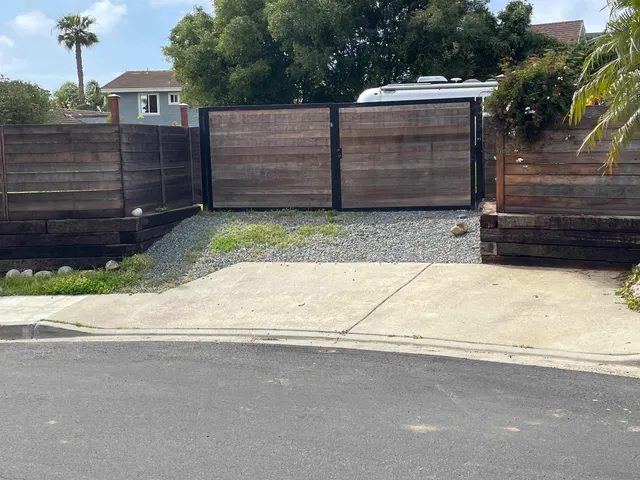 a view of a house with a street