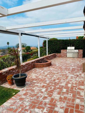 a view of a porch with furniture