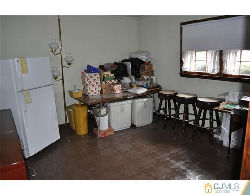 48 Smith Road Somerset, NJ 08873 - Photo 17 of 23 a living room with chairs
