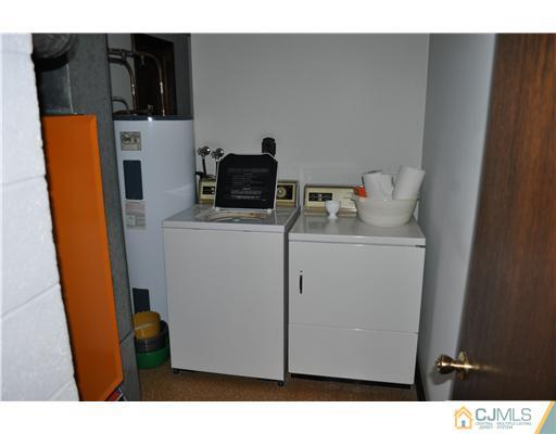 48 Smith Road Somerset, NJ 08873 - Photo 23 of 23 a utility room with dryer and washer