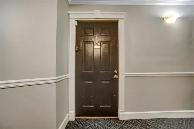a kitchen with stainless steel appliances granite countertop a stove and a microwave