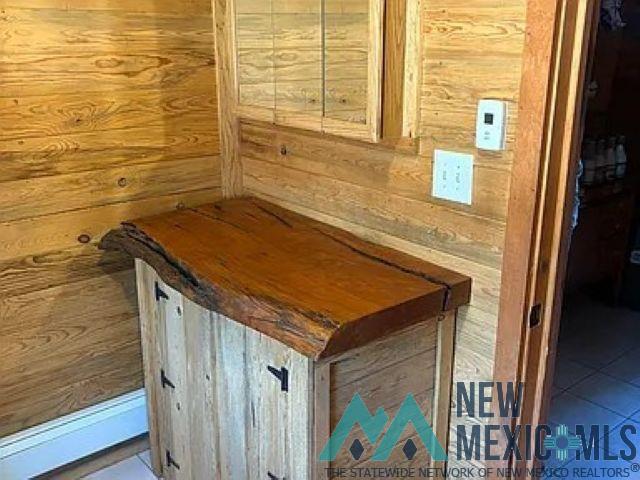 32 Hickey Road Pie Town, NM 87827 - Photo 18 of 39 Detailed view of wood walls