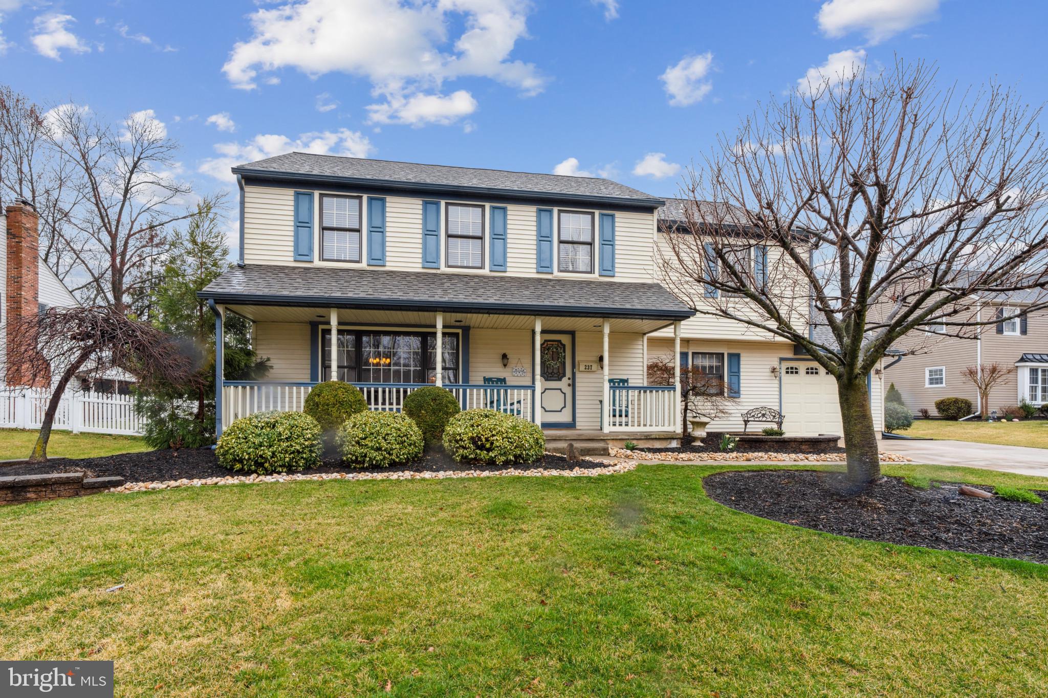 237 Aqua Lane Delran, NJ 08075 - Photo 1 of 35 a front view of a house with garden and trees