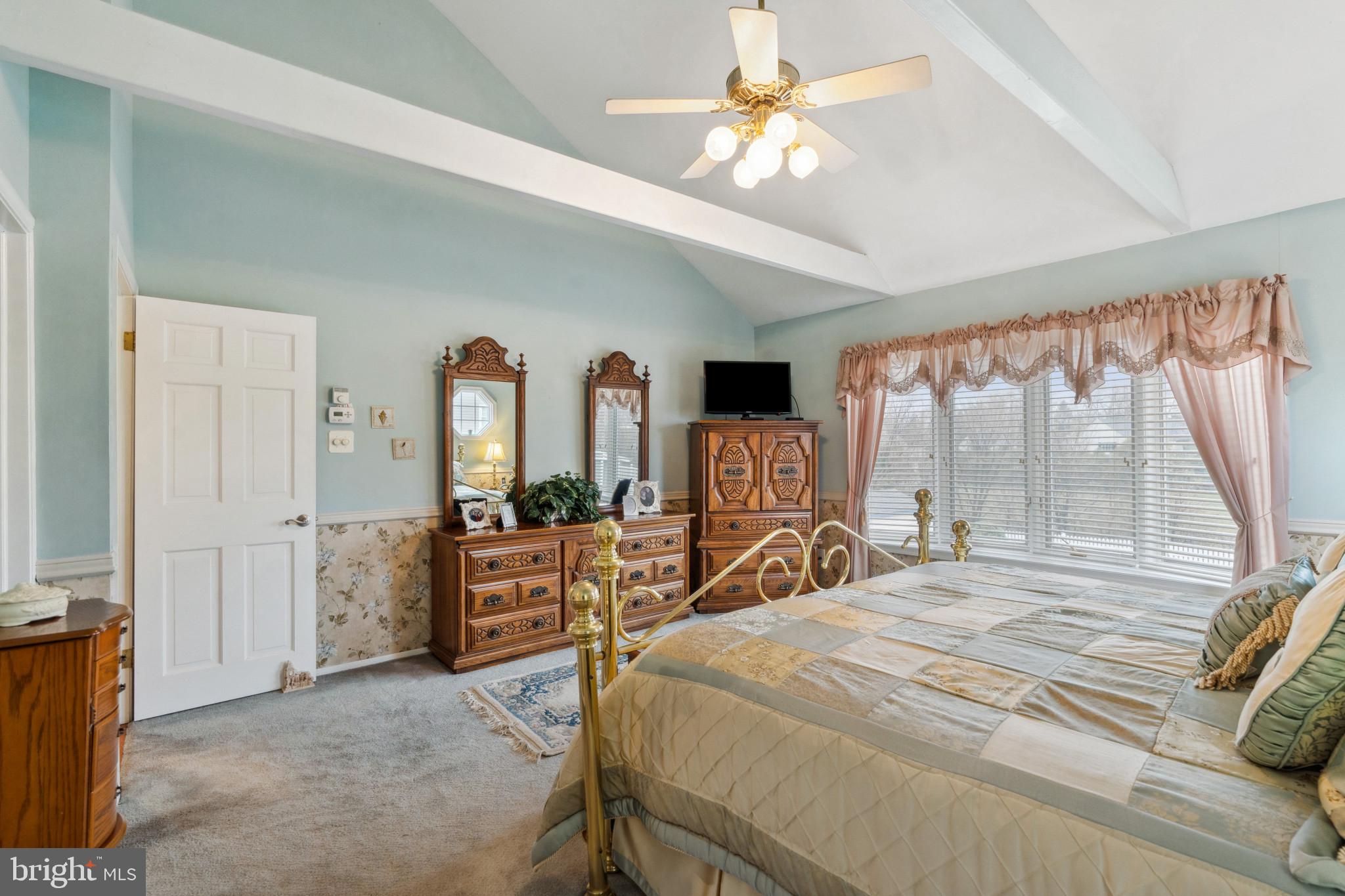 237 Aqua Lane Delran, NJ 08075 - Photo 20 of 35 a bedroom with a large bed and a chandelier