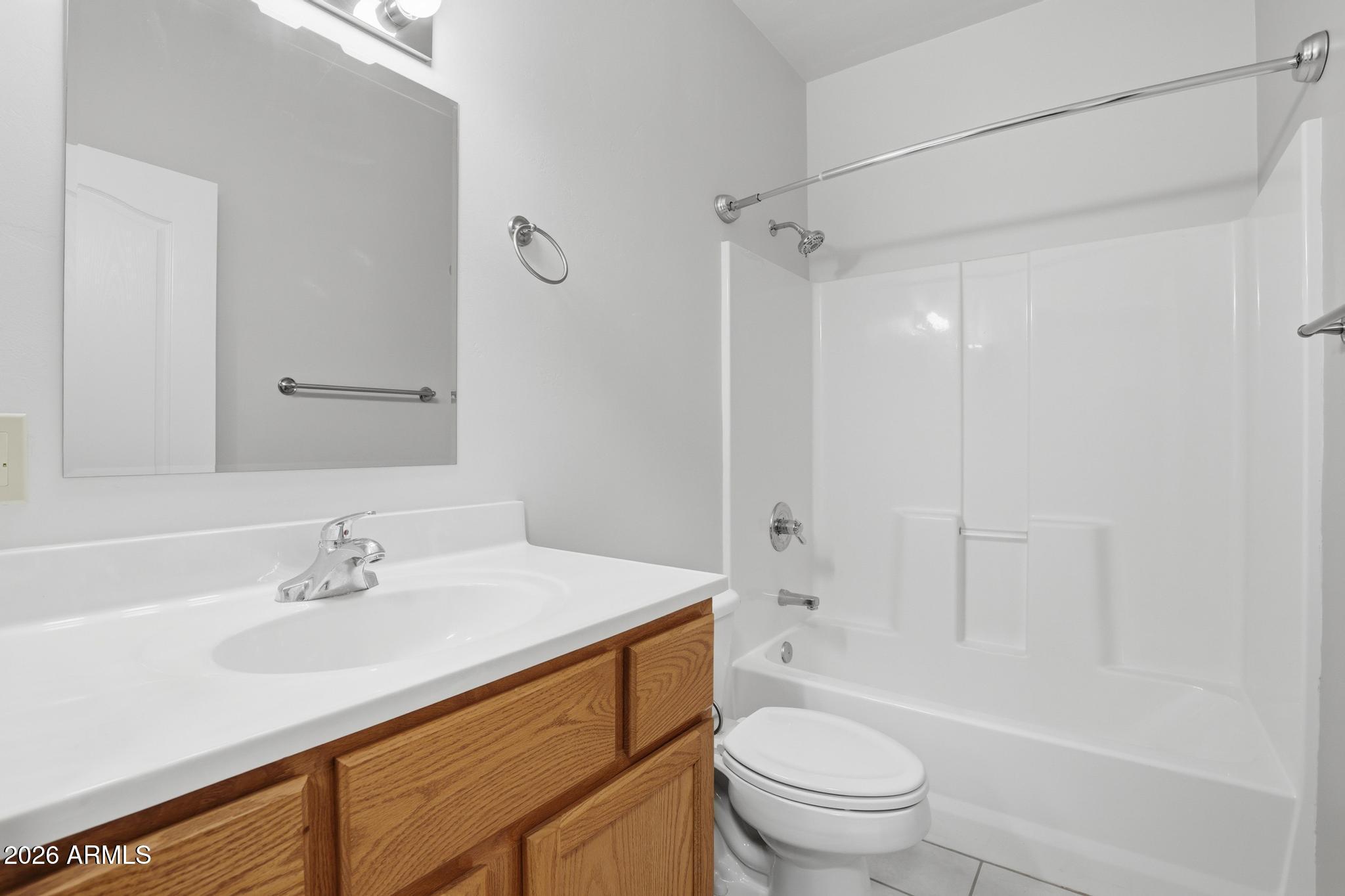 408 East Phoenix Street Payson, AZ 85541 - Photo 29 of 35 a bathroom with a sink toilet and shower