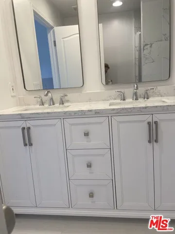 a view of cabinets and window