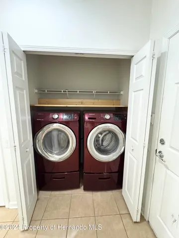 a view of washer and dryer in a utility room
