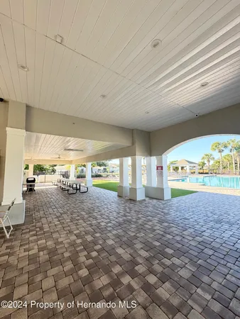 a view of a swimming pool with a lake view
