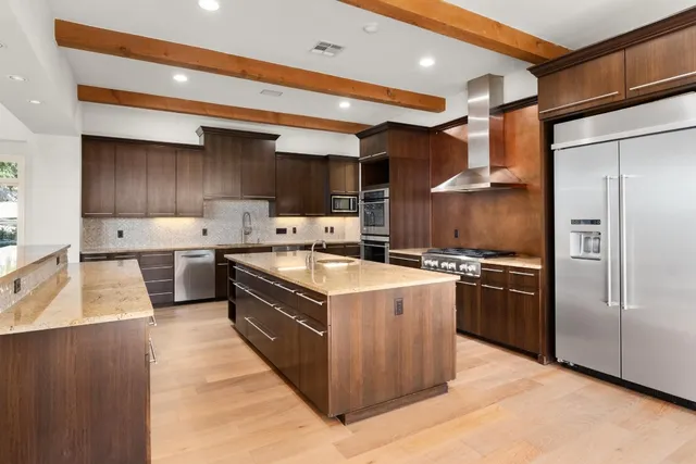 a view of hallway with wooden floor