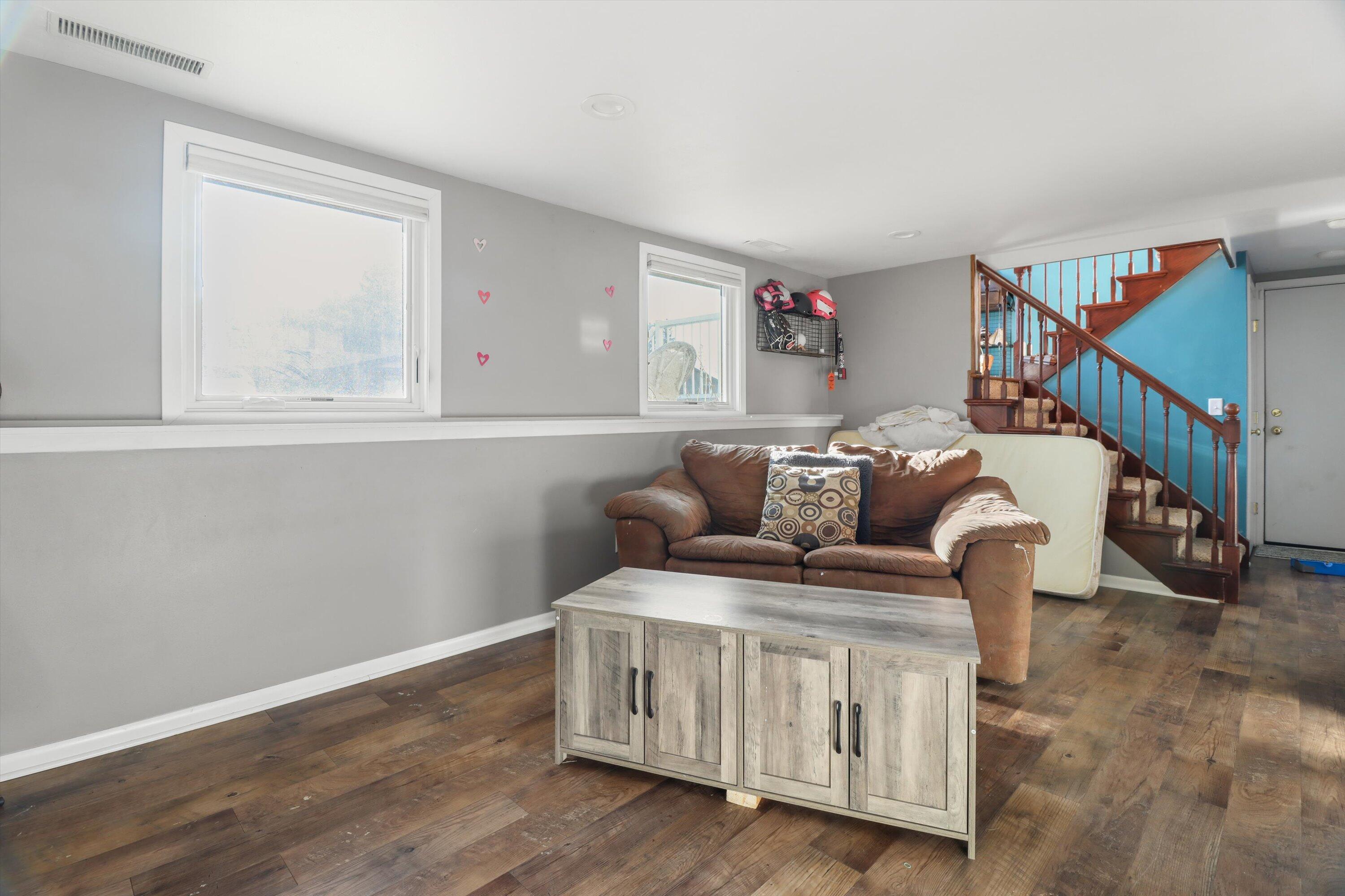 105 Winston Way Waunakee, WI 53597 - Photo 18 of 35 Lower Level Rec Room Area