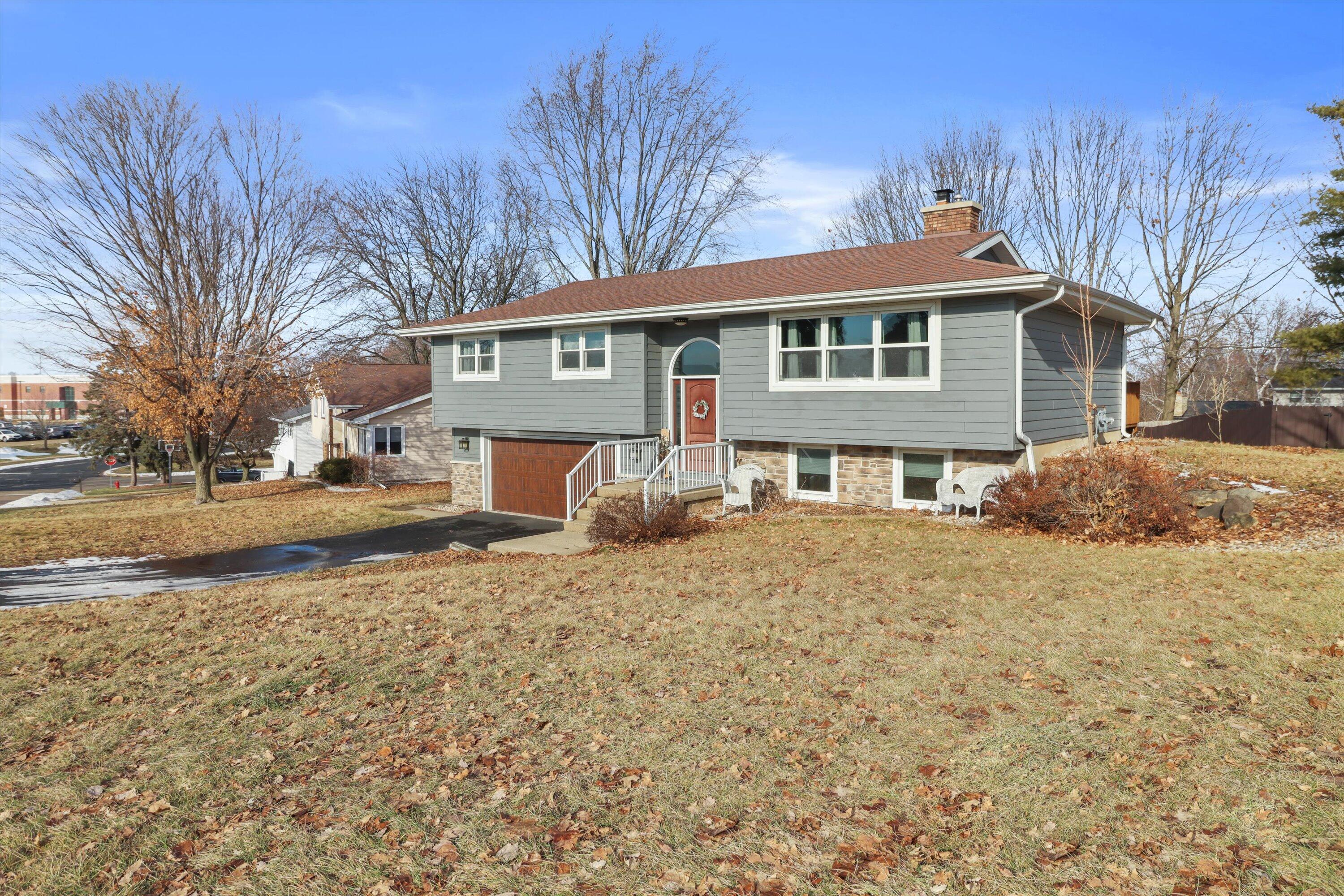 105 Winston Way Waunakee, WI 53597 - Photo 3 of 35 Front of Home and Garage